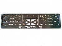 Рамка номера пластик с защелкой, черная, рельеф, TOYOTA серебро (уп.30 шт.)