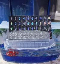 Игрушка на панель TM-832 Рыбки Немо, с табло под номер телефона