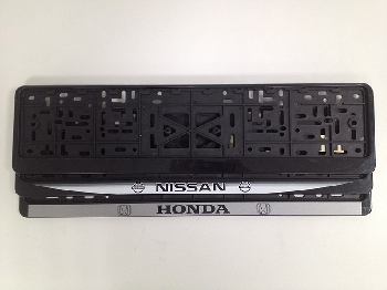 Рамка номера пластик с защелкой, черная, надпись NISSAN (уп.30 шт.)
