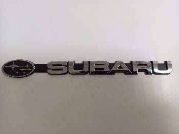 Шильдик металлопластик SUBARU + эмблема, серебро 