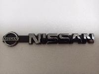 Шильдик металлопластик NISSAN + эмблема, серебро 