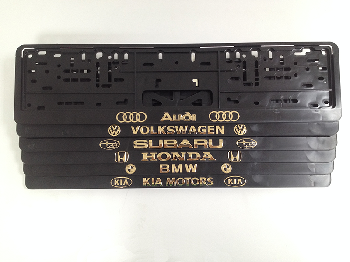 Рамка номера пластик с защелкой, черная, рельеф, VOLKSWAGEN золото (уп.30 шт.)