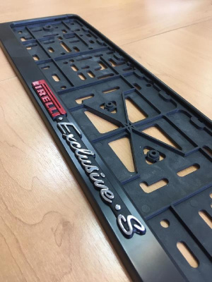 Рамка номера пластик с защелкой, черная, рельеф, PIRELLI EXCLUSIVE`S серебро (уп.30 шт.)